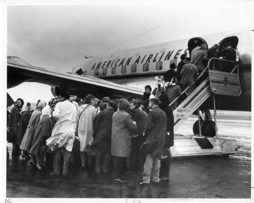 Members of the Eastman Philharmonia preparing to board their plane at Rochester
