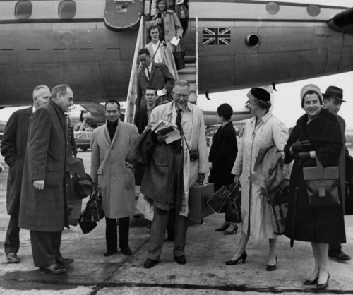 Members of the Eastman Philharmonia, accompanied by their two conductors and chaperones, are here seen alighting from their jet on arrival at Lisbon.