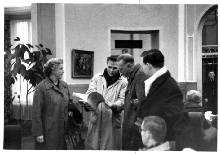 Trumpeter John Landis shows Dr. Hanson some of the scores that he has just acquired in Warsaw while Mrs. Hanson looks on. Throughout the tour, Philharmonia members took advantage of opportunities to purchase scores not easily available on the U.S. market.