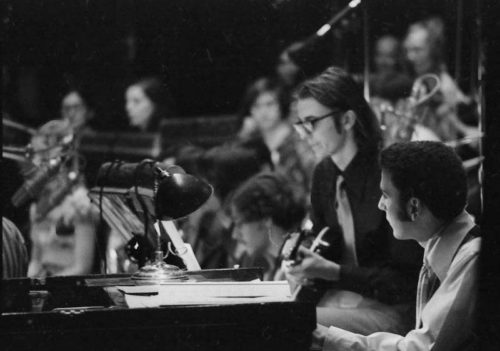 Director Ray Wright and Eastman student-performers on-stage in the Eastman Theater on the occasion of the Eastman Studio Orchestra’s public debut.