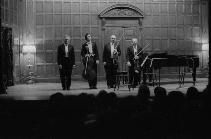 Professor Warren Benson and the members of the Eastman Quartet acknowledge applause on-stage in Kilbourn Hall following the performance of Capriccio.