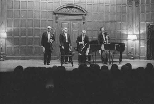 Professor Warren Benson and the members of the Eastman Quartet acknowledge applause on-stage in Kilbourn Hall following the performance of Capriccio.