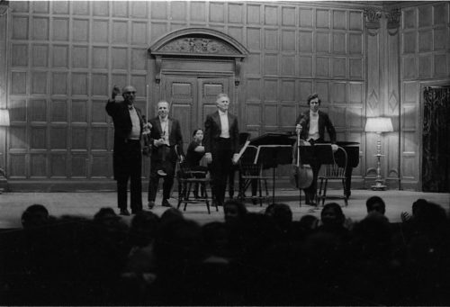 Professor Warren Benson and the members of the Eastman Quartet acknowledge applause on-stage in Kilbourn Hall following the performance of Capriccio.