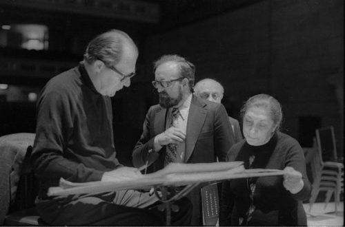 Conductor Walter Hendl, composer Krystof Penderecki, and soloist Felicja Blumental conferring over the score in the Eastman Theater. Ms. Blumental’s husband Markus Mizne is seen in the background in several of these shots.
