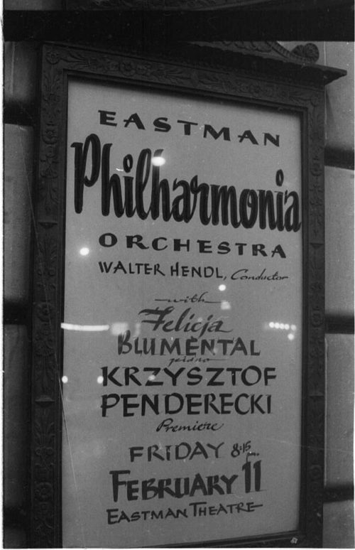 Eastman Philharmonia concert that featured the premiere of Krzystof Penderecki’s Partita for Harpsichord and Orchestra. At the conclusion of the Partita, Maestro Hendl invites the composer to the stage for bows. In the last shot, the composer, the soloist, and the conductor all join hands to acknowledge the applause.