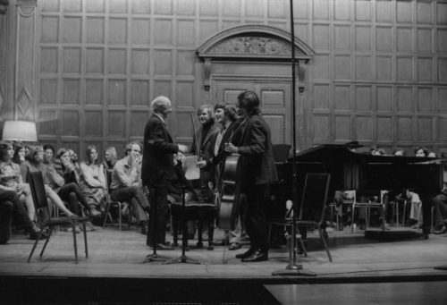 Guest artist Rudolf Serkin in master class with Eastman School students on the stage of Kilbourn Hall.