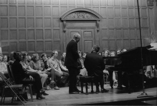 Guest artist Rudolf Serkin in master class with Eastman School students on the stage of Kilbourn Hall.