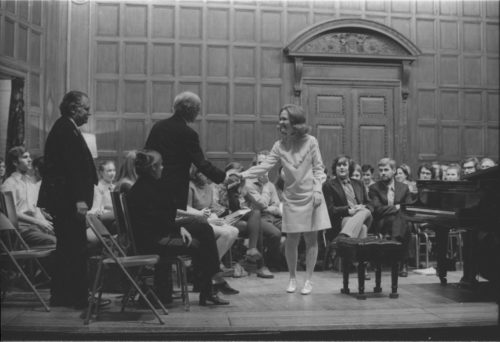 Guest artist Rudolf Serkin in master class with Eastman School students on the stage of Kilbourn Hall.