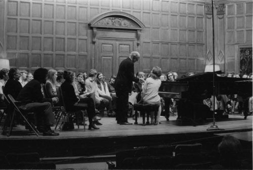 Guest artist Rudolf Serkin in master class with Eastman School students on the stage of Kilbourn Hall.