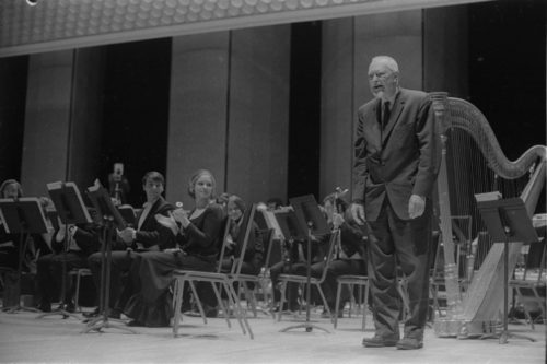 Howard Hanson greets Donald Hunsberger and acknowledges the audience’s applause on the occasion of the Eastman Wind Ensemble’s premiere performance of his Dies Natalis II, April 7th, 1972.