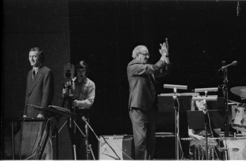 John Beck and EJE Director Jack End acknowledge one another and the applause of the audience