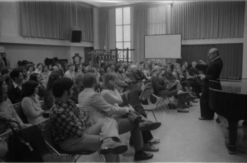 r. Schonberg making points to the large audience of listeners.