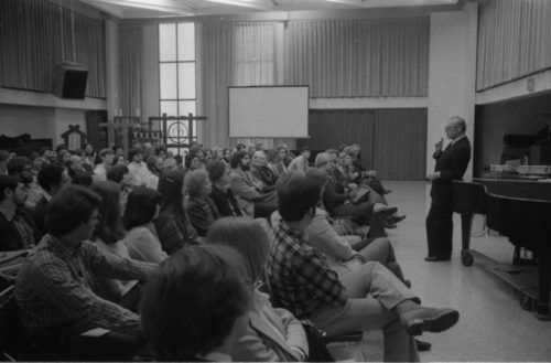 r. Schonberg making points to the large audience of listeners.