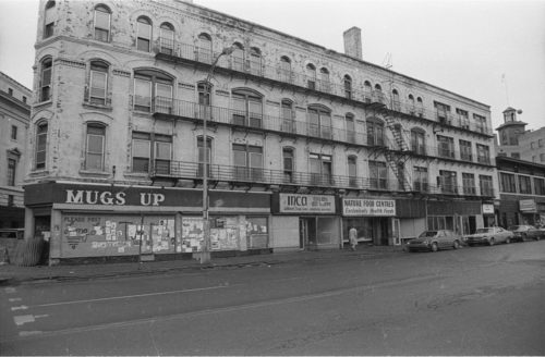 shots of the corner of Main and Gibbs Streets, taken from the north, before demolition of this side of the city block.