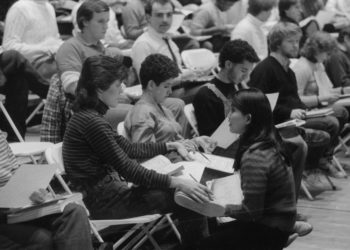 On the day of the recording session, December 10th, 1983, members of the chorus and the vocal soloists all participate in preliminaries.