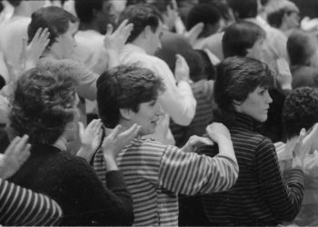 On the day of the recording session, December 10th, 1983, members of the chorus and the vocal soloists all participate in preliminaries.