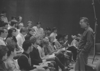 On the day of the recording session, December 10th, 1983, members of the chorus and the vocal soloists all participate in preliminaries.