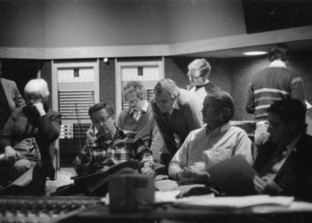 Principals gather in the control room to hear playbacks. Variously seen in these shots are conductor Donald Neuen, producer Ray Wright, recording engineer Ros Ritchie, harpsichordist Arthur Haas, and several of the vocal soloists.