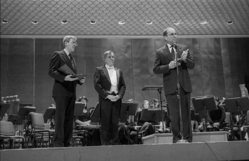 Dr. Donald Hunsberger, conductor of the Eastman Wind Ensemble since 1964, is presented with the National Band Association Academy of Wind and Percussive Arts Society Award by Edward Lisk, President of the NBA.