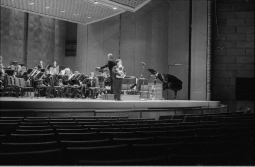 The Eastman Wind Ensemble on-stage in the Eastman Theater: first under Frederick Fennell, and then under Donald Hunsberger, with tuba soloist Toru Miura. 