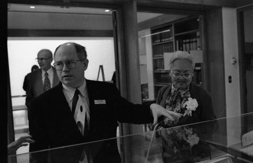 Ted Honea, Special Collections Librarian and Archivist, narrates an exhibit for guests