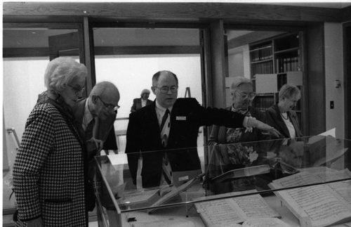 Ted Honea, Special Collections Librarian and Archivist, narrates an exhibit for guests