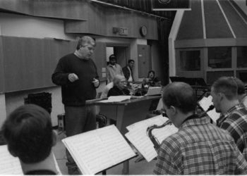 Fred Sturm conducts while Bob Brookmeyer