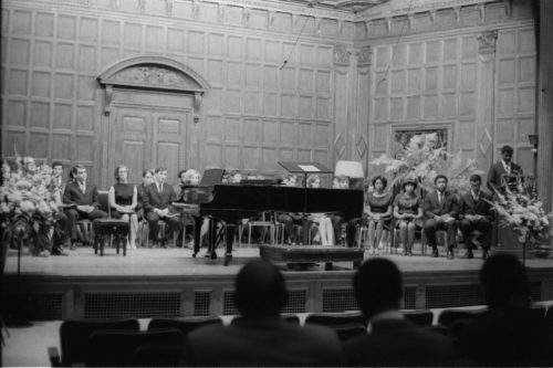 At right are the speakers at the memorial service for Dr. Martin Luther King, Jr. on April 9th, 1969. William Crimm is standing at the lectern; seated to his right, from right to left, are Paul Burgett, Joseph Bias, Connie Jones, and Mary Henderson.