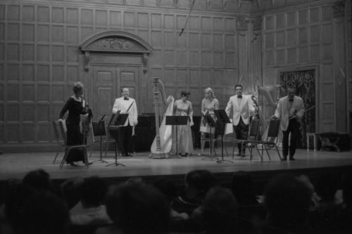 Performers on-stage in Kilbourn Hall for Images by Wayne Barlow, June 28th, 1969. Harpist Suzanne Thomas is assisted by strings players Carroll Glenn, Anastasia Jempelis, Francis Tursi, and Alan Harris and clarinettist Stanley Hasty. American Harp Society 6th national conference.