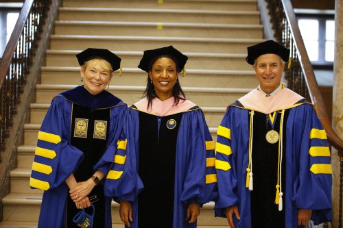 2021 Commencement speaker Kelly Hall-Tompkins ‘93E (center) is shown with University of Rochester President Sarah Mangelsdorf (left) and Eastman Dean Jamal J. Rossi (right)