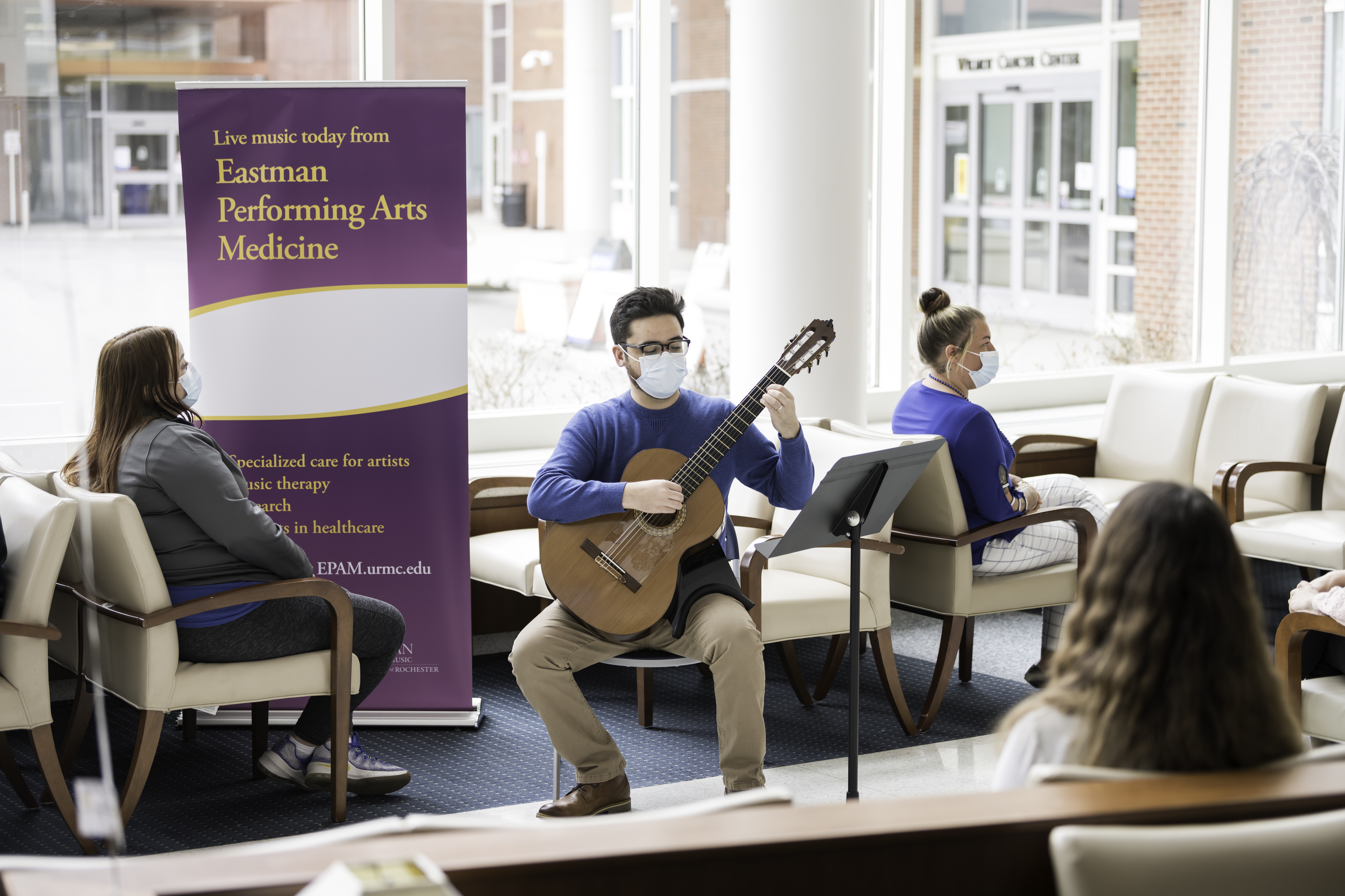 Guitarist playing at Strong Memorial Hospital