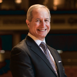 Jamal J. Rossi, the Joan and Martin Messinger Dean of the Eastman School of Music, is pictured in Kodak Hall at Eastman Theatre