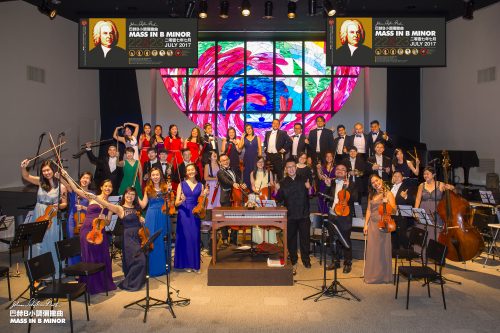 image of orchestra standing