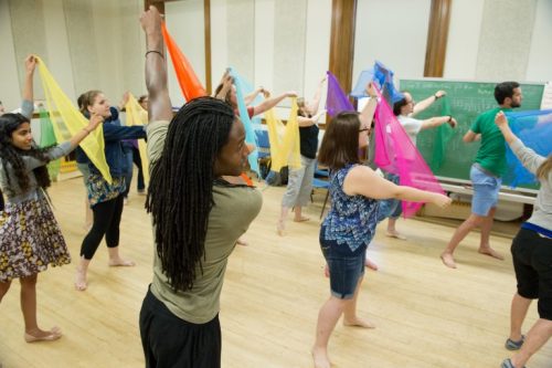 image of dancers with scarves