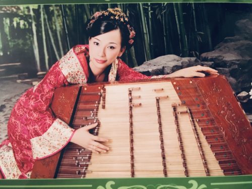 Wenzhuo Zhang with the Yangquin, or Chinese hammered dulcimer