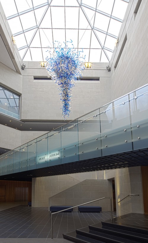 Wolk Atrium, showing the Dale Chihuly glass sculpture titled “Blue and Gold Chandelier”